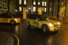 Matthew Parker St, London, UK - 11 Dec 2019 - EU Flag Mafia minis outside Conservative Central Office, Matthew Parker St, London.