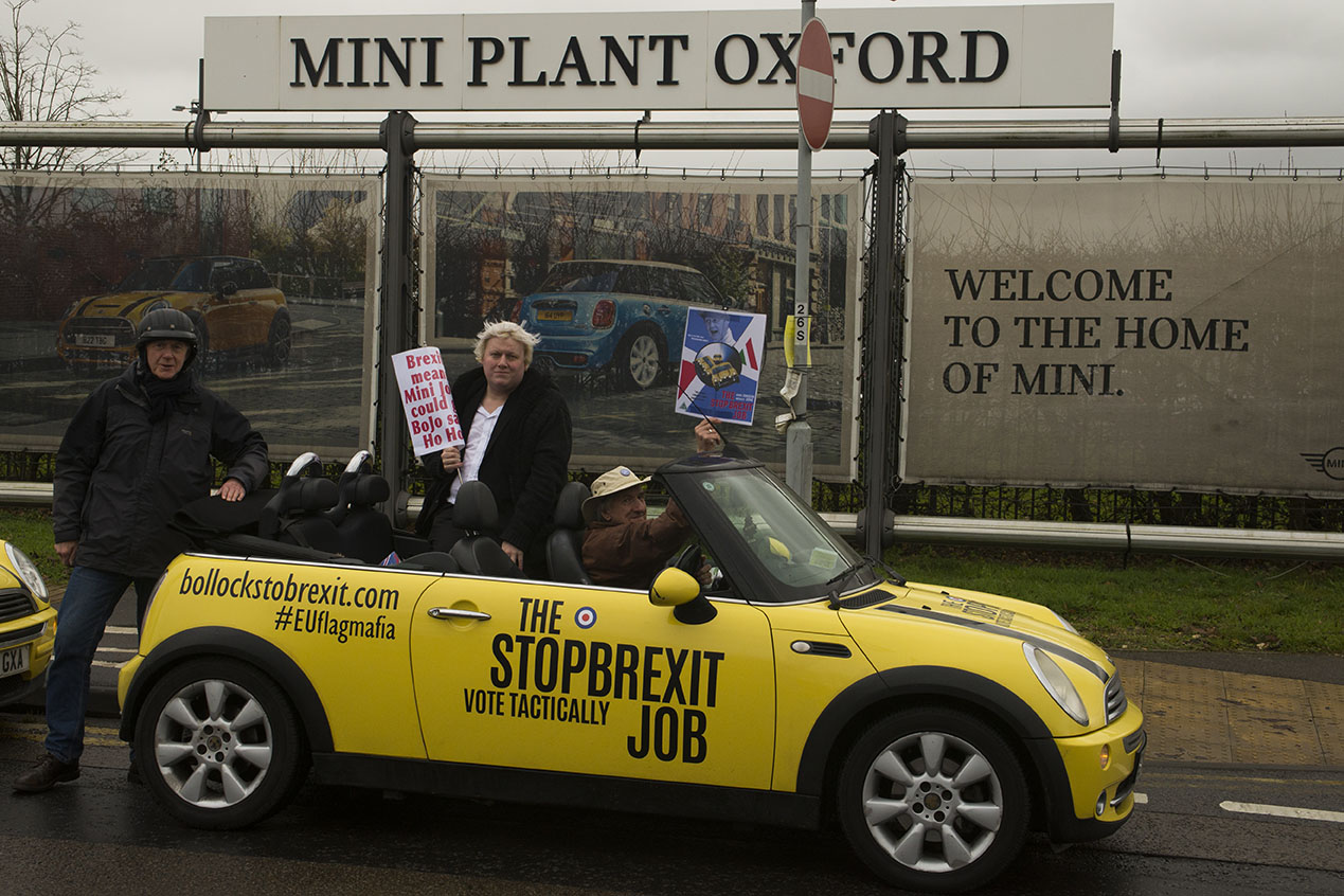 Oxford, UK - 06 Dec 2019 - EU Flag Mafia minis visit Oxford (the Cowley Mini Factory), to protest against Brexit and call for a tactical vote. The minis used by the group were built in the UK but have BMW engines highlighting the single market approach to manufacture. This is under threat with Brexit. EU Flag Mafia are an anti-brexit protest group.