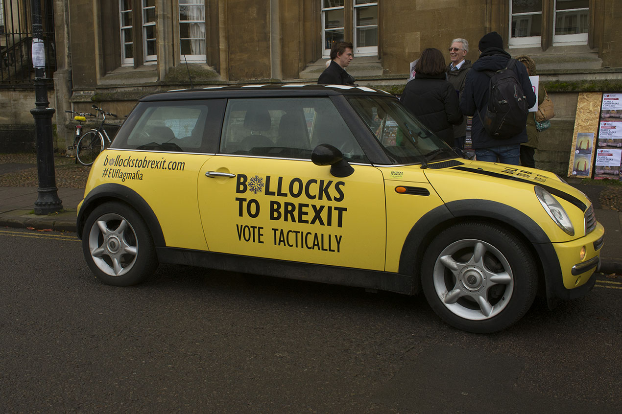 Oxford, UK - 06 Dec 2019 - EU Flag Mafia minis visit Oxford (including the Cowley Mini Factory), to protest against Brexit and call for a tactical vote. EU Flag Mafia are an anti-brexit protest group.
