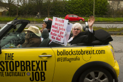 Oxford, UK - 06 Dec 2019 - EU Flag Mafia minis visit Oxford (the Cowley Mini Factory), to protest against Brexit and call for a tactical vote. The minis used by the group were built in the UK but have BMW engines highlighting the single market approach to manufacture. This is under threat with Brexit. EU Flag Mafia are an anti-brexit protest group. Boris Johnson impersonater Drew Galdron in shot.