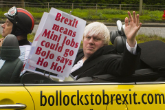 Oxford, UK - 06 Dec 2019 - EU Flag Mafia minis visit Oxford (the Cowley Mini Factory), to protest against Brexit and call for a tactical vote. The minis used by the group were built in the UK but have BMW engines highlighting the single market approach to manufacture. This is under threat with Brexit. EU Flag Mafia are an anti-brexit protest group. Boris Johnson impersonater Drew Galdron in shot.