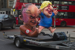 Kingston-on-Thames, UK - 07 Dec 2019 - Anti Brexit protest group EU Flag Mafia bought 3 minis and, along with a Jacques Tilley float depicting Boris Johnson and Dominic Cummings toured Esher, Kingston, Uxbridge and Ickenham,