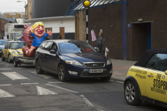 Kingston-on-Thames, UK - 07 Dec 2019 - Anti Brexit protest group EU Flag Mafia bought 3 minis and, along with a Jacques Tilley float depicting Boris Johnson and Dominic Cummings toured Esher, Kingston, Uxbridge and Ickenham,